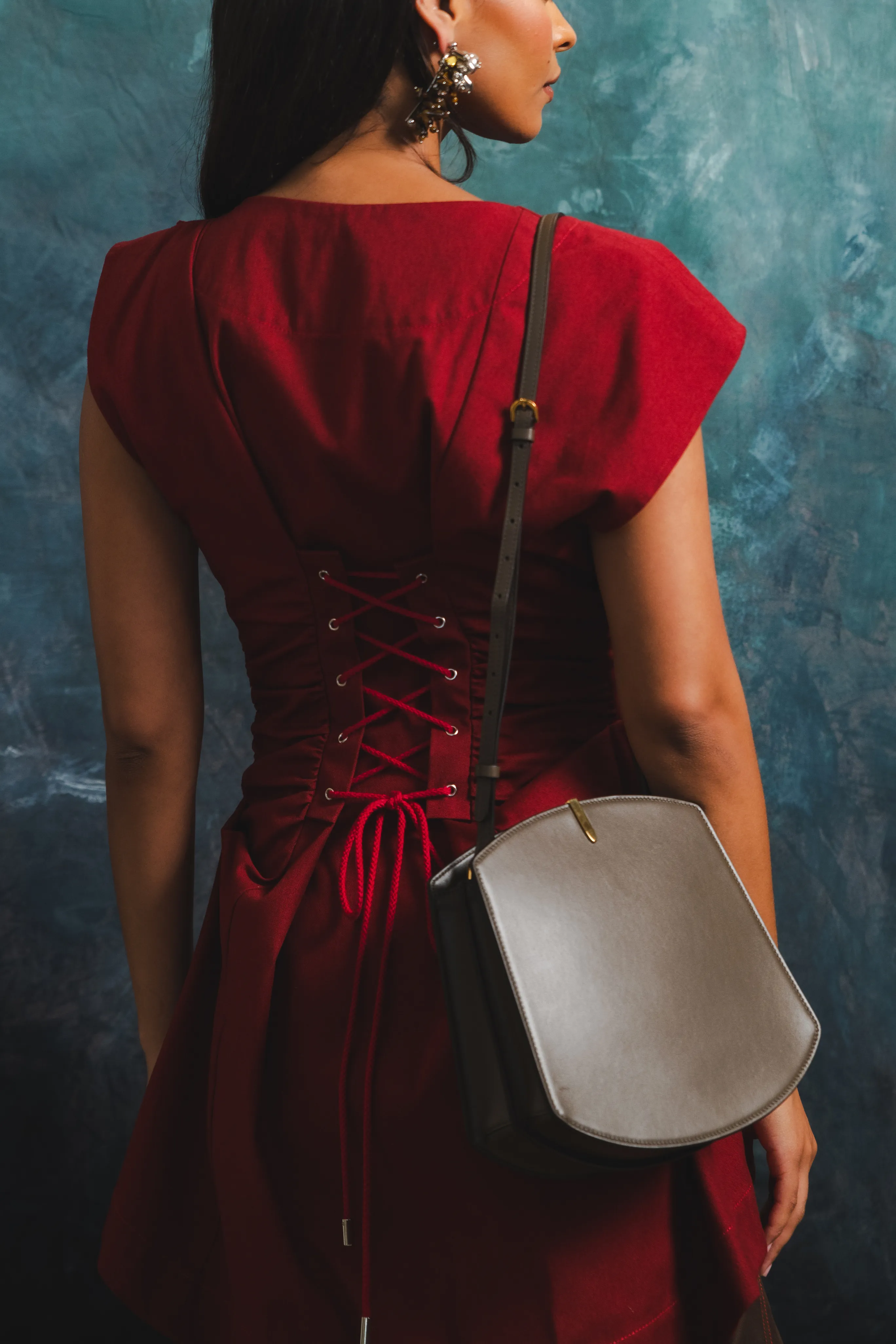 Bound Seam Edges Stretch Knit Material Pleated Button Blouse with Lace Up Back